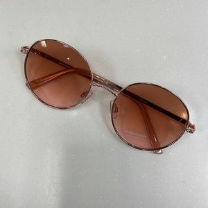 Light orange round gold frame sunglasses